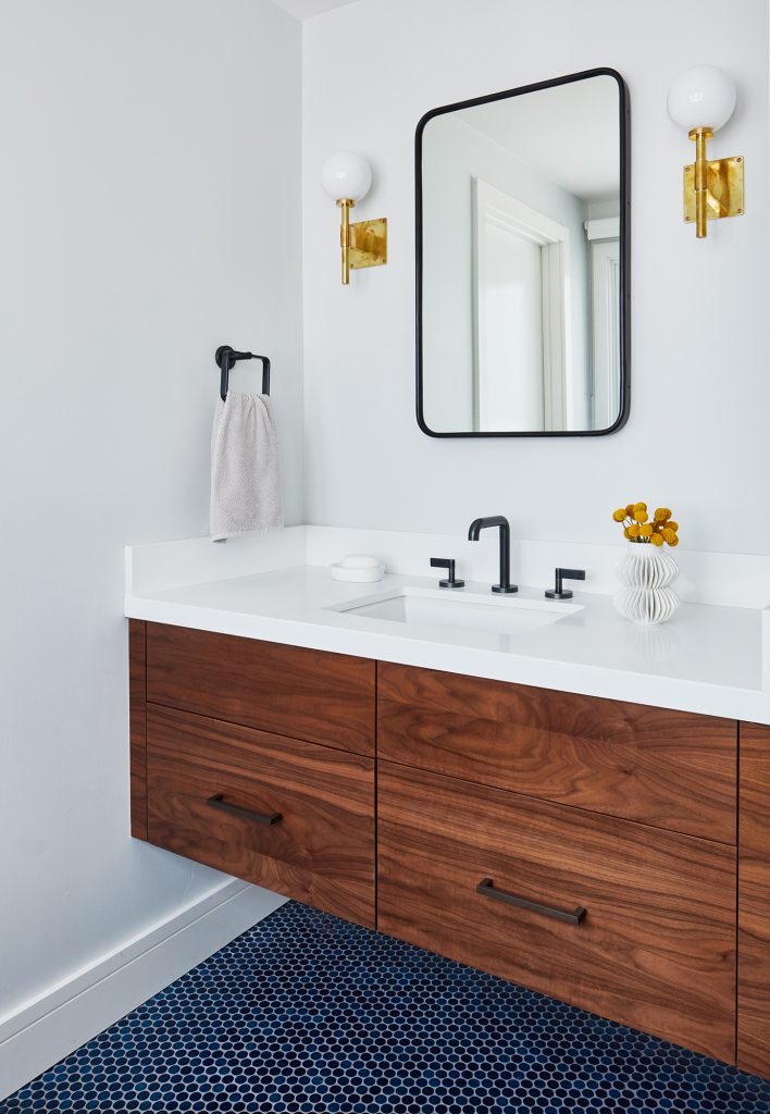Modern bathroom remodel with custom vanity and modern fixtures by Bay Area interior designers