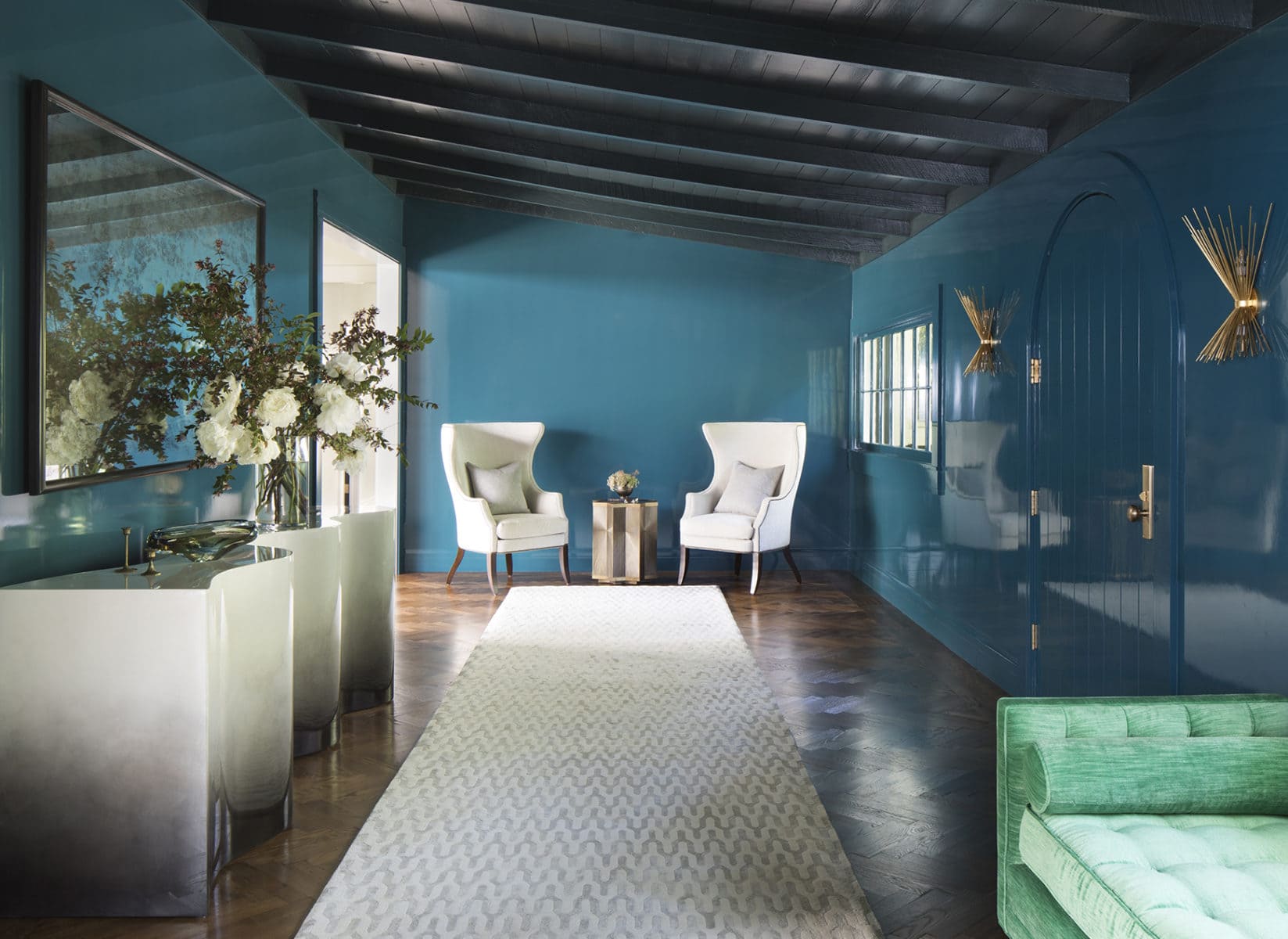 Dramatic lacquered foyer in a Woodside home designed by Bay Area interior designers