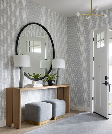 Entryway with patterned wallpaper in a Sonoma home designed by California interior designer