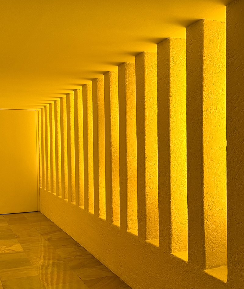 Luis Barragán yellow hallway Casa Gilardi photos interior design