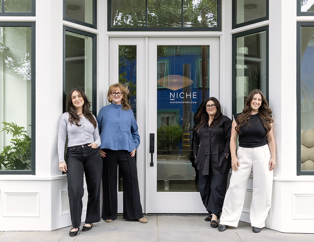 the interior design team at niche interiors in front of their San Francisco studio